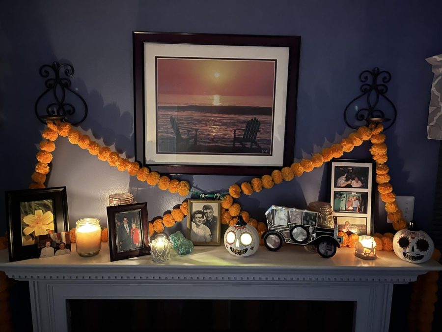 The Connellys’ Ofrenda has seasonal decorations and meaningful photos, and they even plan to add food closer to the holiday!  