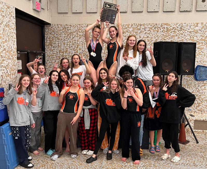 Swim it ‘til you win it! Pictured above are the FHS Swim Girls posing by the podium after winning counties for the second year in a row, hence all the peace signs. Photo Courtesy of Addy Rebasti.