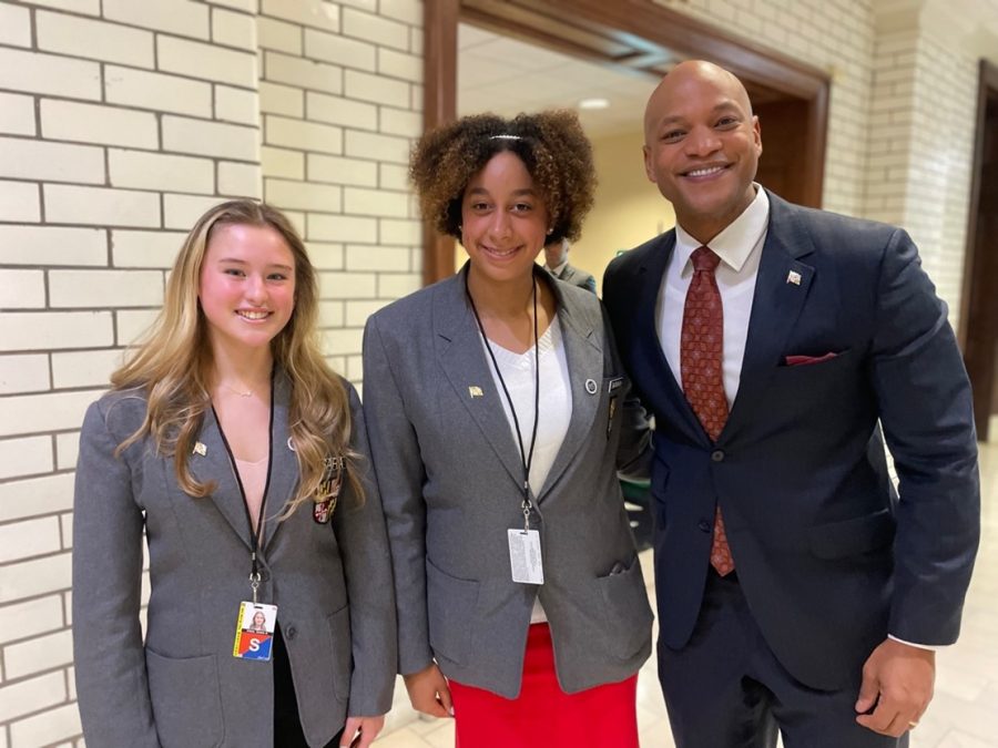 Sara King (left) is pictured with another page and the Governor, Wes Moore (right). Photo courtesy of Sara King.