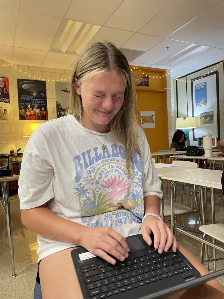 Senior, Chloe McCarthy, with a single tear rolling down her face as she works on her college essay. 

Photo Courtesy of Lindsey Dettloff 