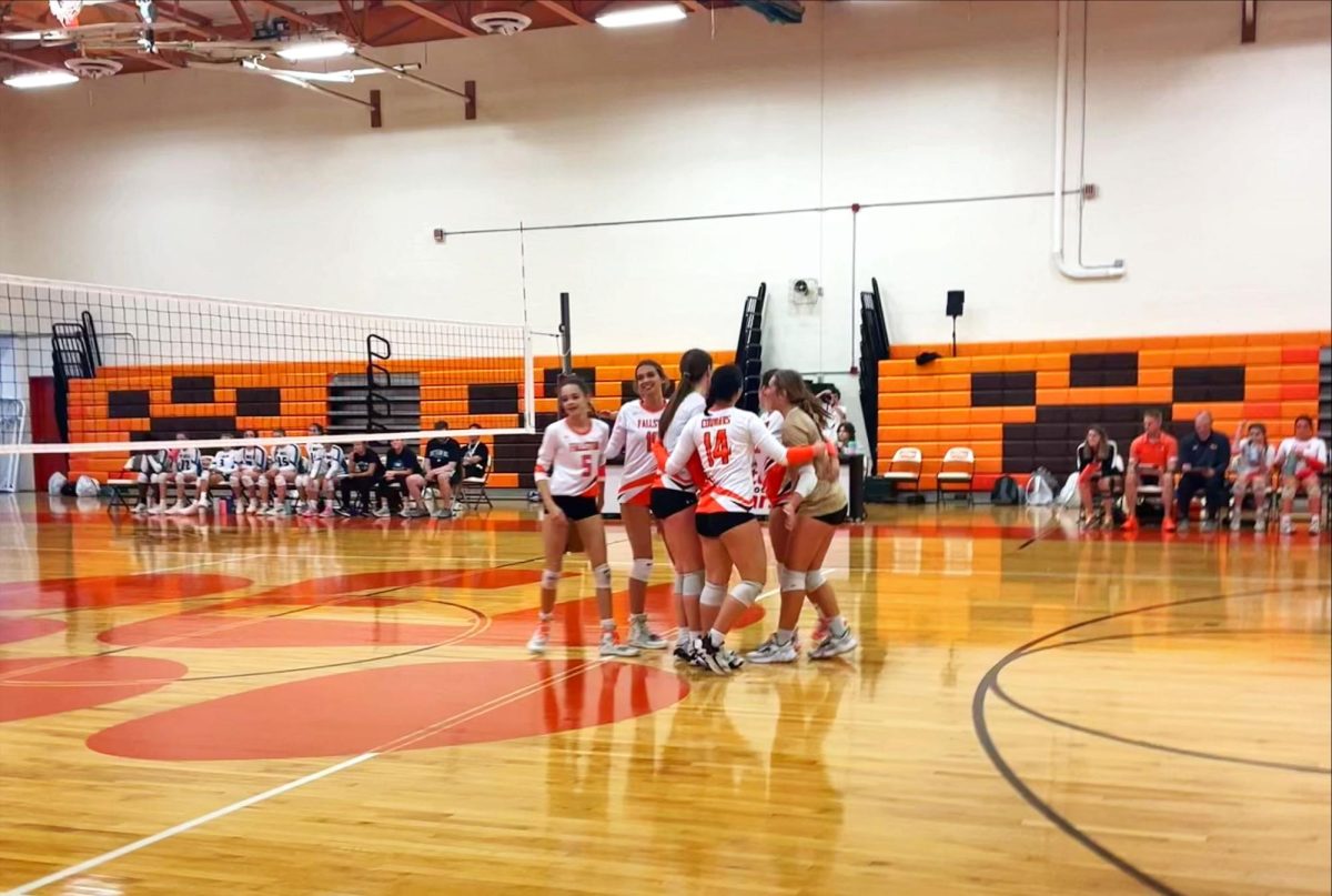 Fallston celebrates a point together in the fifth set. 
Photo Courtesy of Lindsey Dettloff 