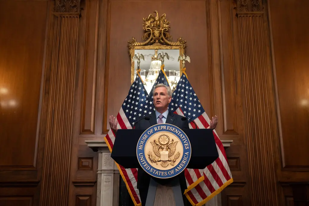 McCarthy at the podium. (Photo courtesy of the New York Times)