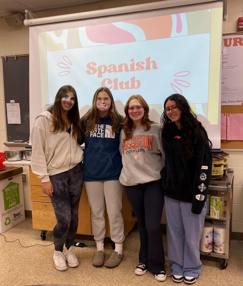 Spanish club officers posing for a picture. From left to right, Arianna Hernandez, Claire Musser, Angelina Velez, and Chloe Mullineaux. (Photo courtesy of Kasey Conlon.)