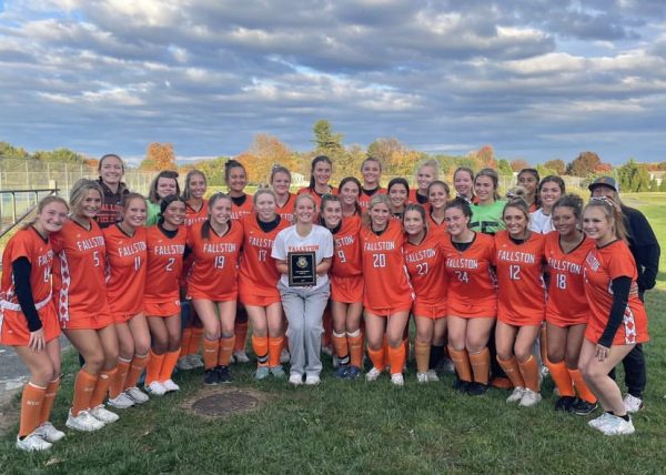 The team posing with their newly won regional plaque. Photo Courtesy of @fallston_fieldhockey’s Instagram 