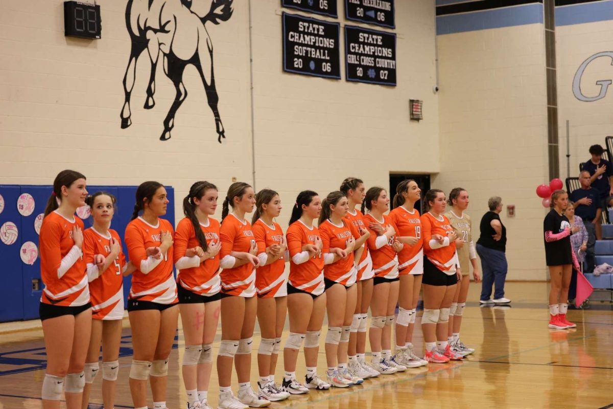 Fallston stands together in C-Milton Wright’s court. Photo Courtesy of Emma Dunca.
