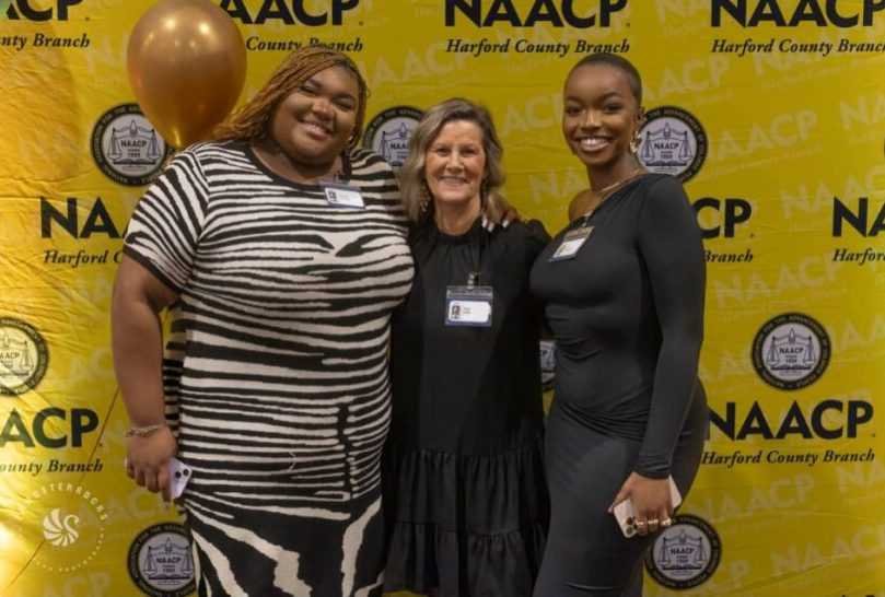 Logan Taylor (far left), Mrs. Graf (middle), Jade Mashua (far right), at the brunch. Picture courtesy of NAACP Facebook page.  