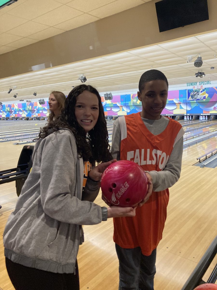  Meghan Perez with Langston Pannell as he is about to take his turn bowling. (Photo Courtesy of Megan Grant)