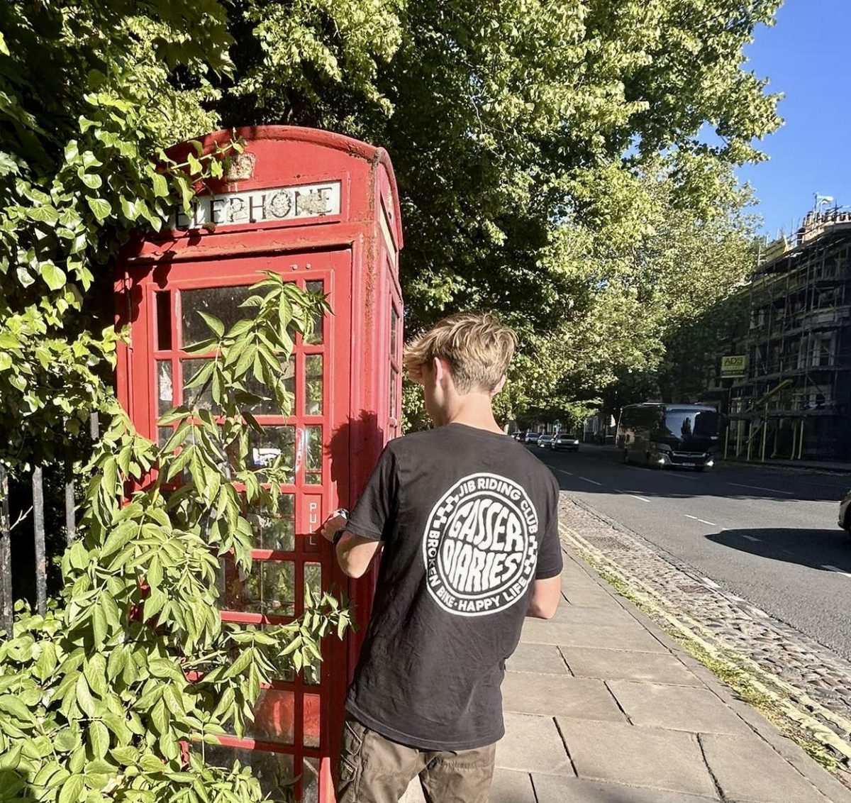 Harry Plaisted observes the telephone booth as it is not a very common sight in today's day and age. (Photo courtesy of Harry Plaisted).  