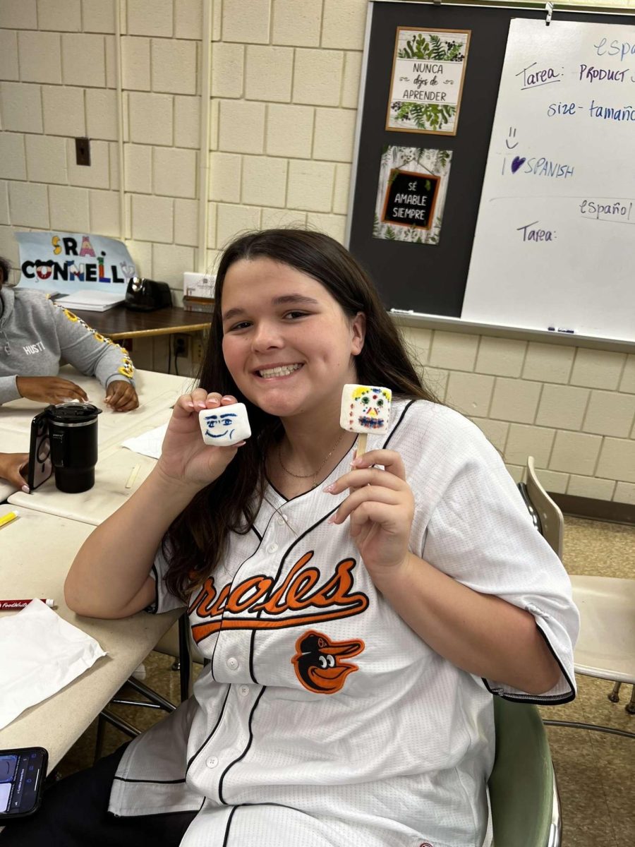 Freshman Samantha Newman shows off her beautifully decorated skulls. (Photo courtesy of Chloe Mauler) 