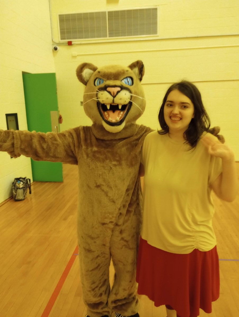 Jewell Staples posing with GAR after the first pep rally. Photo Courtesy of Mary Grandea.