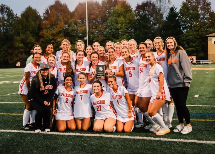 Fallston Field Hockey gathers for a photo after a dominating win against the Patterson Mill Huskies resulting in the overall win of the 1A North Regional Championship. Photo Courtesy of Three Lilacs Photography.