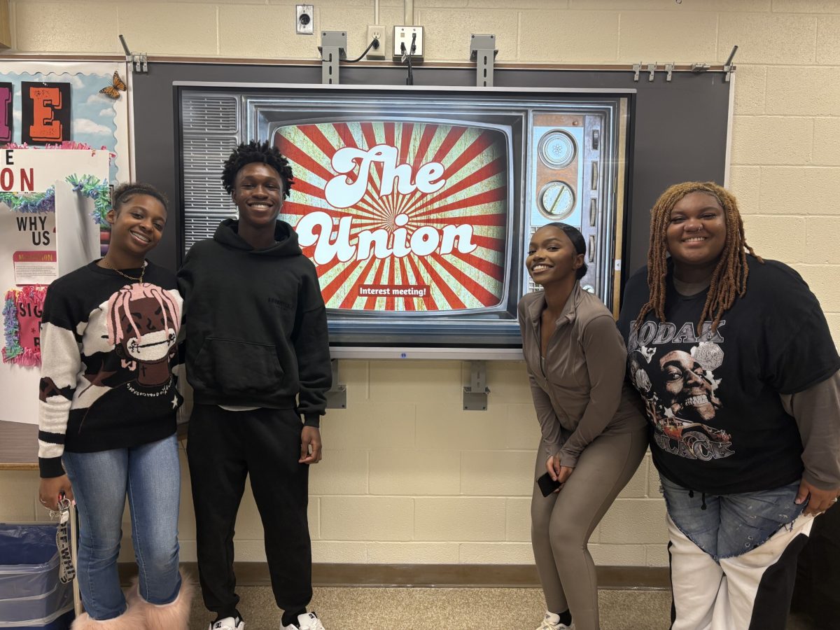 Club Officers Italy Caldwell, Mark Gyampoh, Jade Mashua, and Logan Taylor (left to right) prepare to host their first interest meeting. (Not Pictured: Zoe Rogers & Landyn Foster) Photo courtesy of Louis Liu.