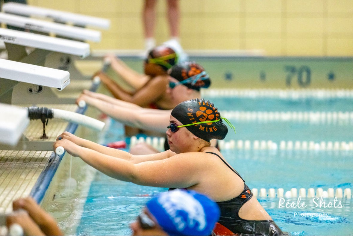 Maddy Burch is poised to start the 100-backstroke event. (Photo courtesy of Reale Shots Photography.)