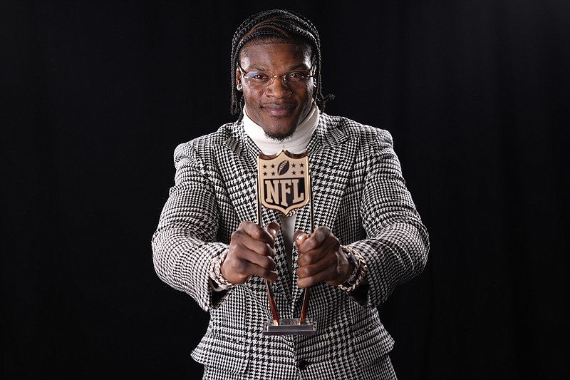 Ravens QB Lamar Jackson with his second MVP award during 2024’s NFL Honors (Photo courtesy of AP, Matt York)