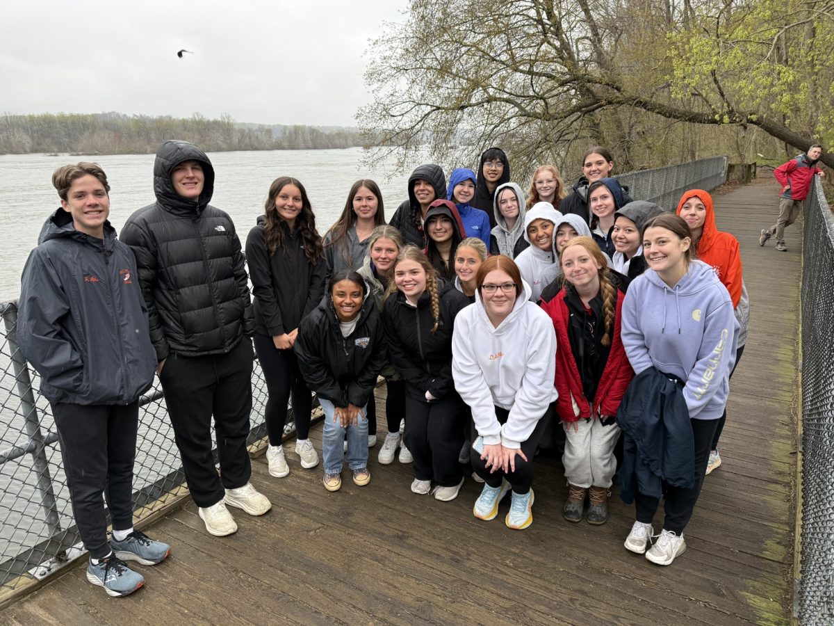 While students gather for a picture, looking closely at this photo, you will see Mr. McLeod lurking in the background. Photo Courtesy of Mrs. Cummings.