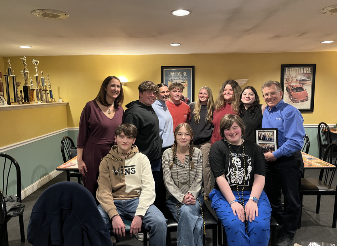 Last years Mock Trial team, celebrating their successful run in the playoffs. Photo Courtesy Sammy Evans