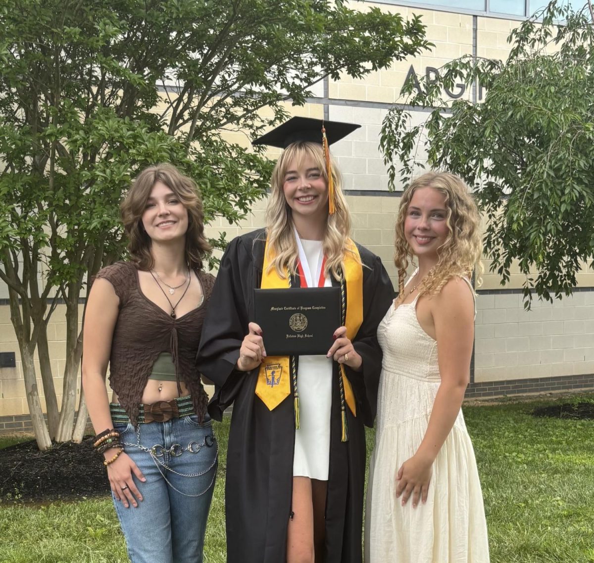 Photo Caption: (From right to left) Ella Colburn, Sarah Gnagey, and Madi Hoyer celebrate Sarah’s graduation from Fallston with a picture outside Harford Community College. (Photo Courtesy of Madi Hoyer.)