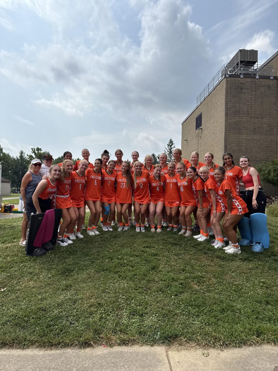 Fallston High School varsity field hockey team, accompanied by head coach Jackie Cummings and legendary coach Alice Puckett, after an impressive performance at the Alice Puckett Invitational. Photo courtesy of Rebecca Streett