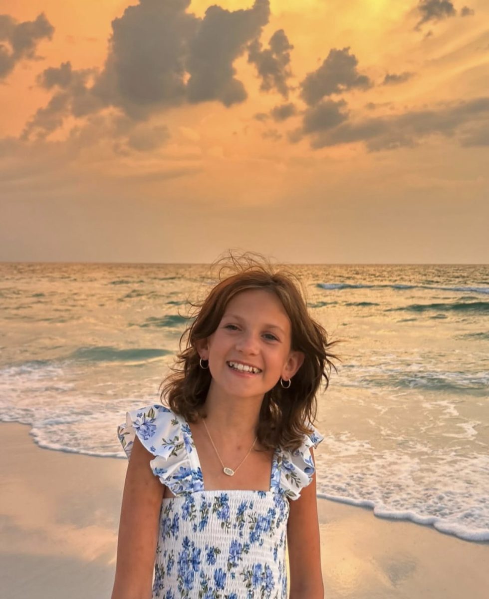 Caption: Zuza Beine poses in front of a captivating sunset, just months before the tragic passing. This picture was posted with the announcement of her passing via her Instagram, @zuzas_way_to_healing. Photo Courtesy of Instagram 
