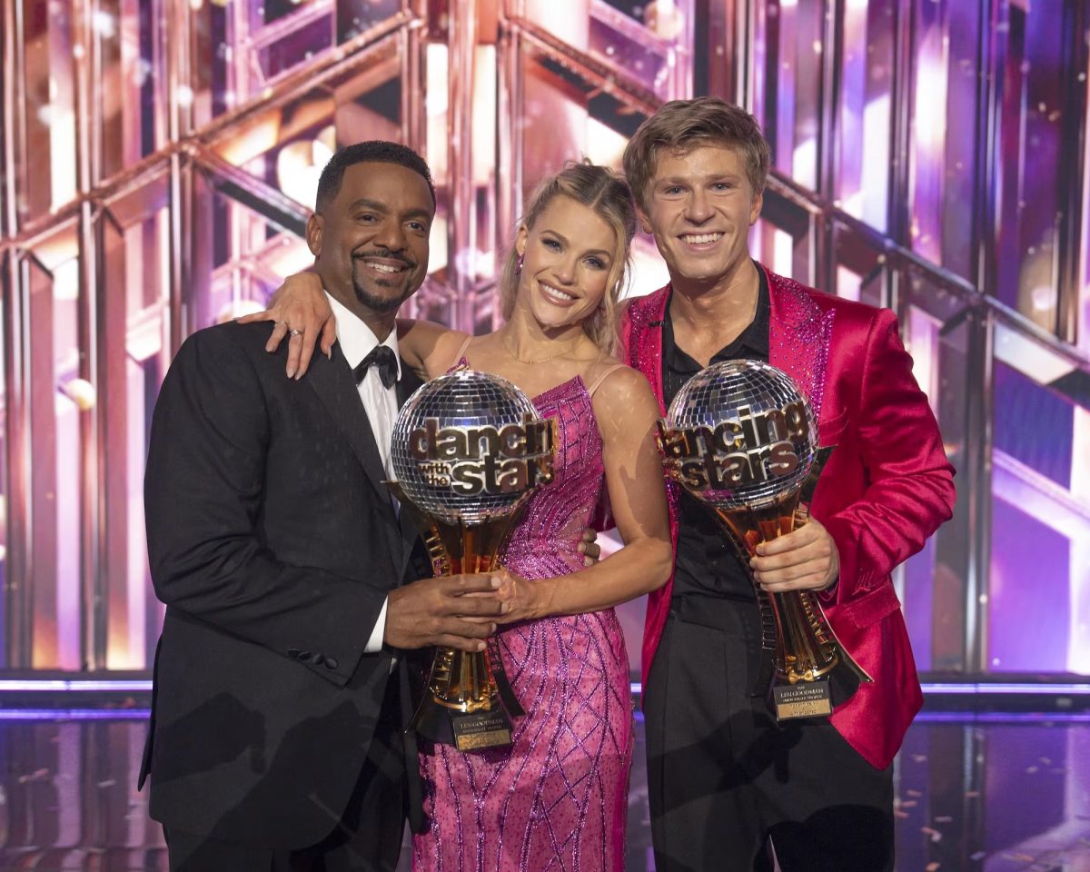 Robert Irwin and dance partner, Whitney Carson, pose with their newly acquired Mirrorball, after winning the 34th season of Dancing with the Stars. Photo courtesy of Parade.