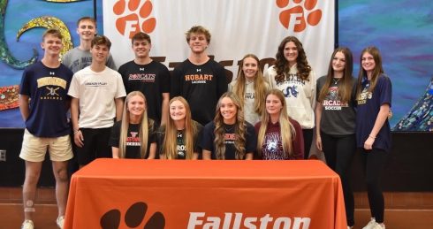 Fallston High School’s senior athletes pose together on signing day, celebrating their commitments to competing at the collegiate level. Photo courtesy of Reagan Stevens.