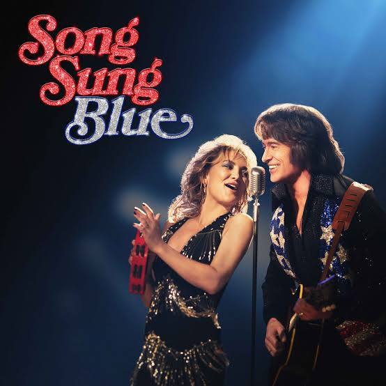 Actors Hugh Jackman and Kate Hudson pose for the official Song Sung Blue movie poster, exhibiting their shared love for music. Photo Courtesy of IMDb 