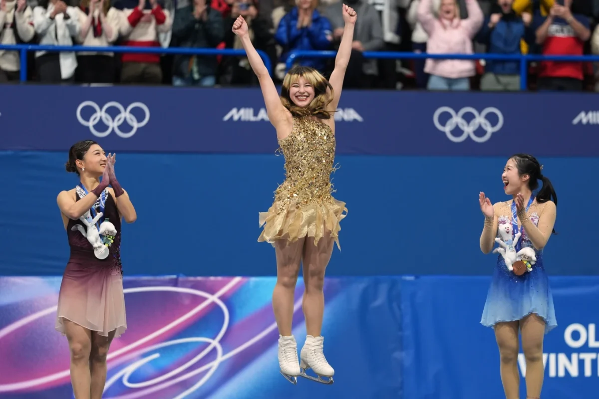 Alysa Liu jumps for joy as she is awarded first place in the women’s free skate program in figure skating at the 2026 Milan Winter Olympics. Photo Courtesy of AP News. 