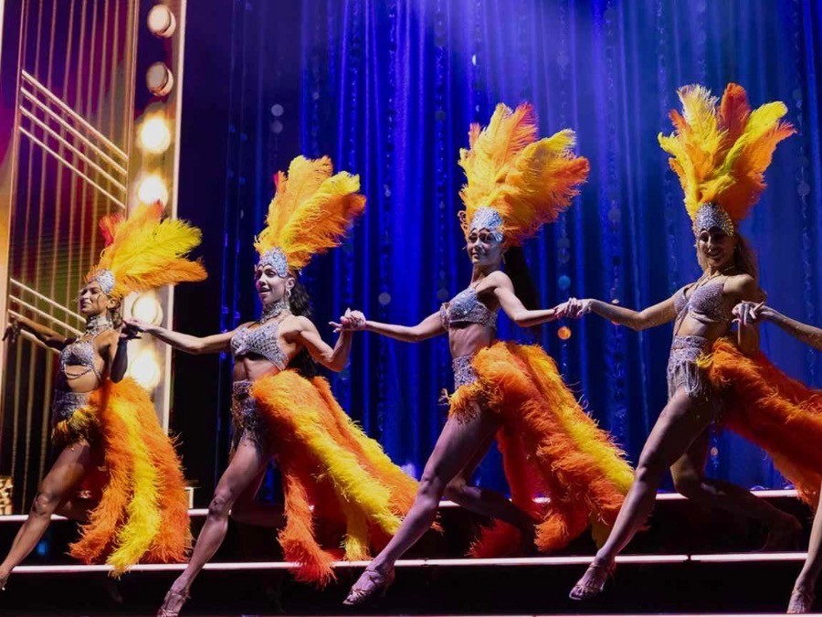 Dancing with the Stars pros; Daniella Karagach, Jenna Johnson, Hailey Bills, and Emma Slater; in their closing number of act one on their 2026 tour. Photo Courtesy of People Magazine.