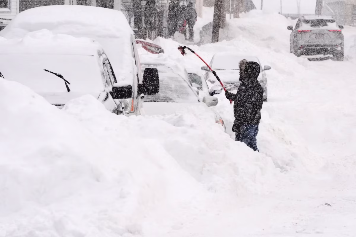 Many were stuck to dig their cars out of the snow, after this disastrous snow storm. Photo Courtesy of the Washington Post. 